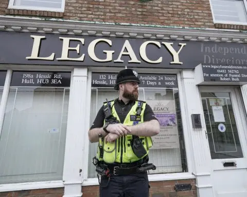 Police remove 34 bodies from English funeral home and arrest 2 for fraud and preventing burial