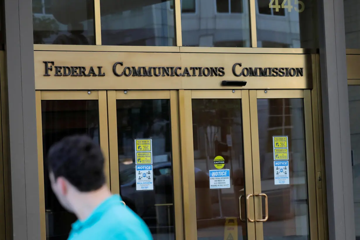 Signage is seen at the headquarters of the Federal Communications Commission in Washington, D.C.