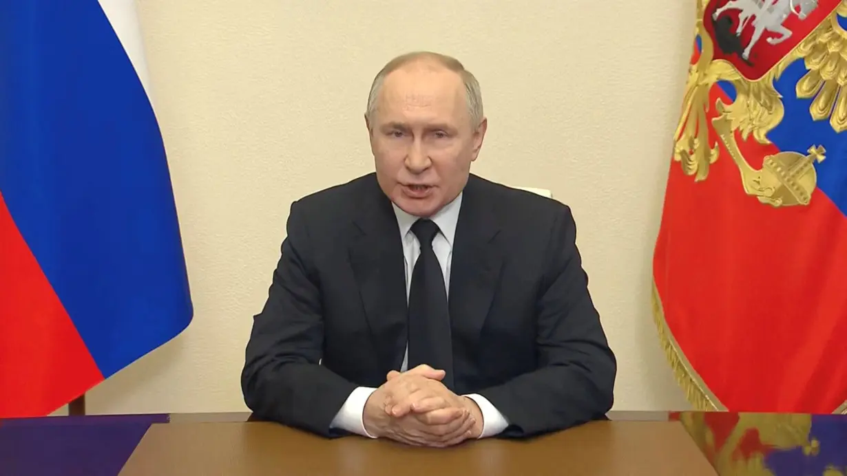 Russian President Vladimir Putin delivers a video address to the nation