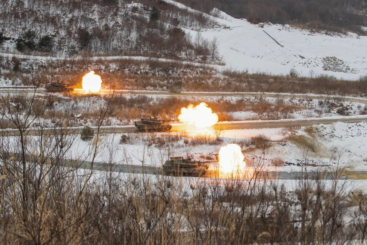 FILE PHOTO: Joint combat firing drills between South Korean and U.S. troops near the demilitarized zone separating two Koreas, in Pocheon