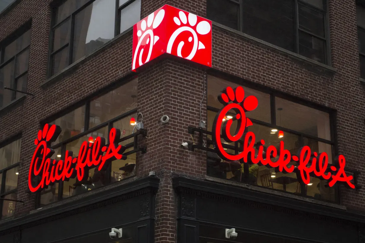 FILE PHOTO: A franchise sign is seen above a Chick-fil-A freestanding restaurant after its grand opening in Midtown, New York