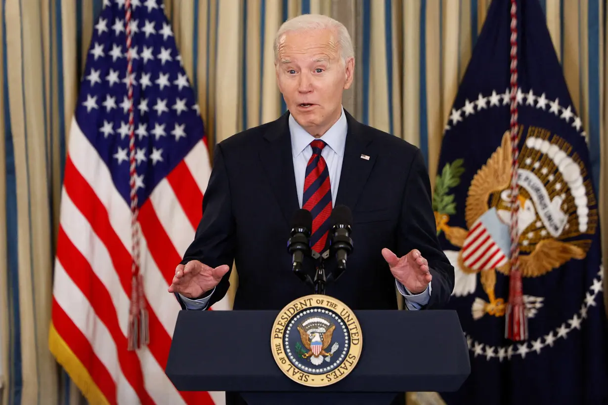 FILE PHOTO: U.S. President Biden delivers remarks before a meeting of his Competition Council, at the White House in Washington