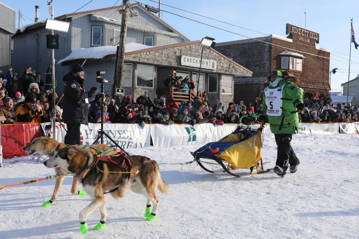FILE PHOTO: Winner Ryan Redington arrives at the Iditarod Trail Sled Dog race finish line