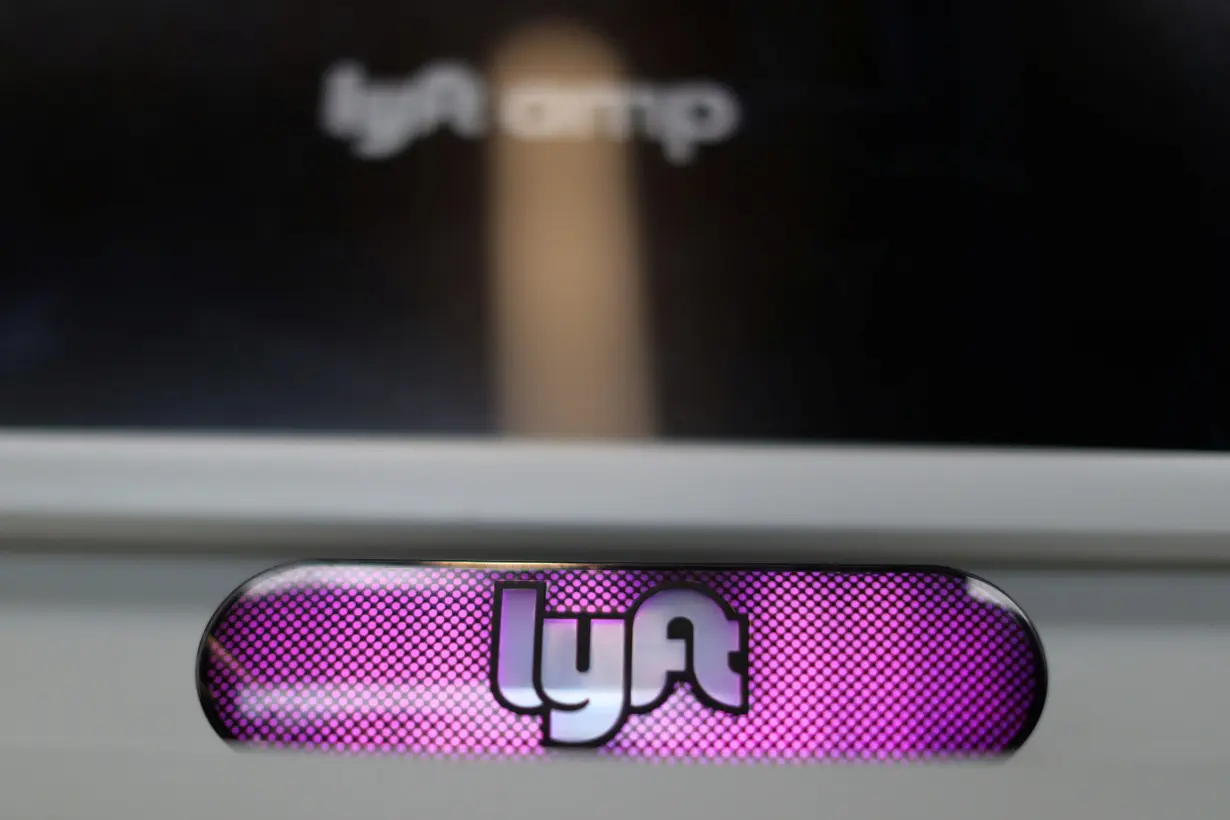 A Lyft logo is seen in the Driver Hub in Los Angeles