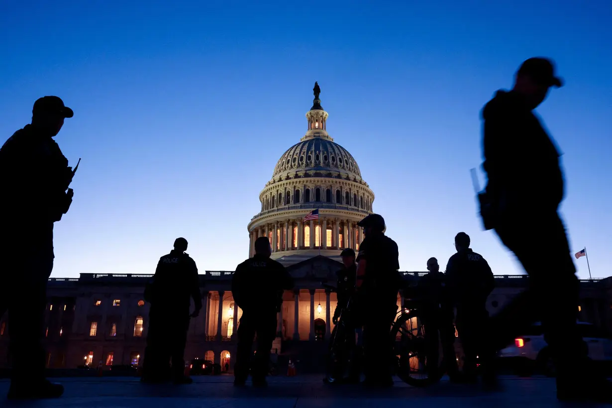 U.S. Capitol Police officers stand guard outside the Capitol prior to the State of the Union address by U.S. President Joe Biden to a joint session of Congress, in Washington