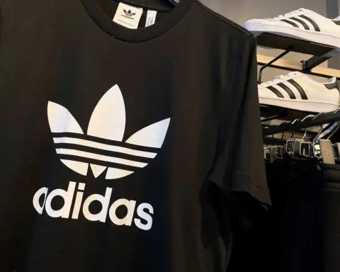 Adidas posts first loss in 30 years but sticks to dividend