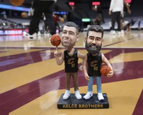 Brothers Travis and Jason Kelce honored with bobblehead giveaway at Cavs-Celtics game