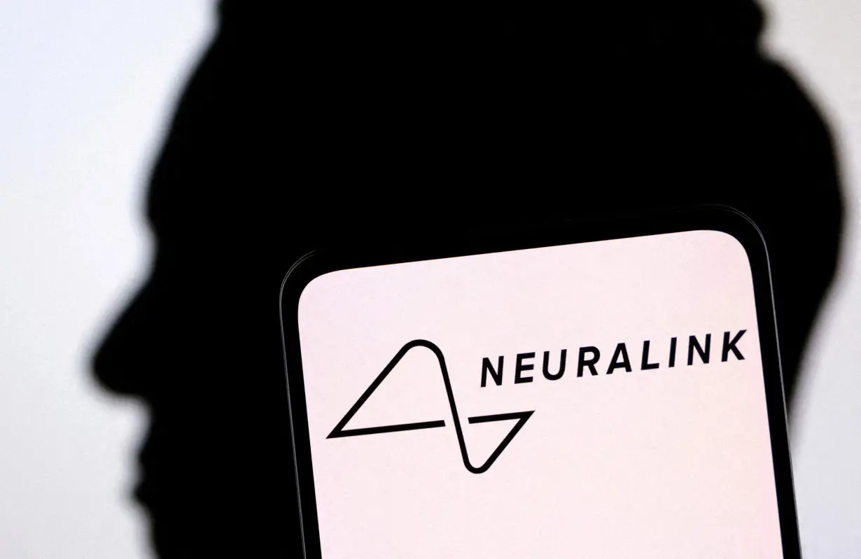 FILE PHOTO: Illustration shows Neuralink logo and Elon Musk silhouette