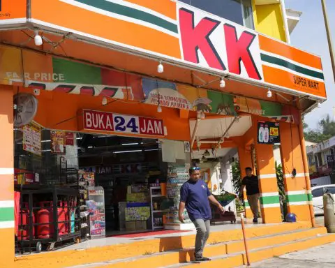 Malaysian convenience store owners charged over 'Allah' socks that angered Muslims