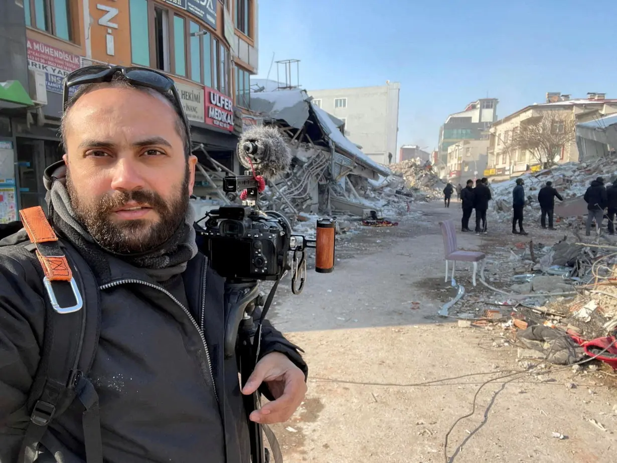 FILE PHOTO: Reuters visuals journalist Issam Abdallah takes a selfie picture while working in Maras, Turkey