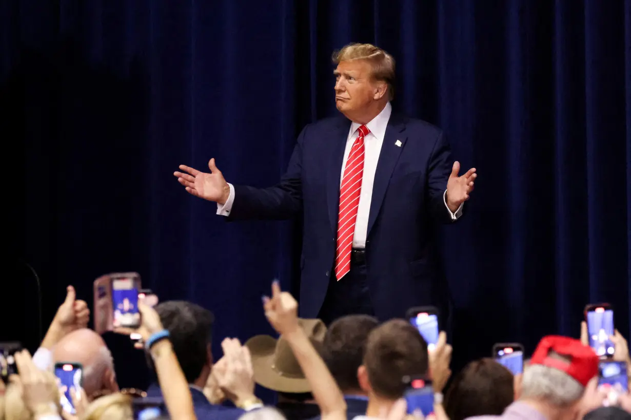 FILE PHOTO: Former U.S. President Trump hosts a campaign rally, in Rome, Georgia