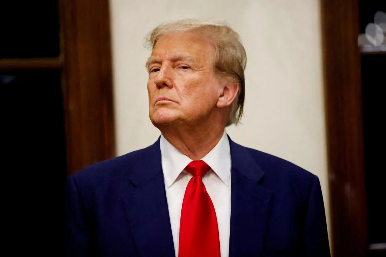 FILE PHOTO: Republican presidential candidate and former U.S. President Donald Trump at his Trump International Golf Club in West Palm Beach