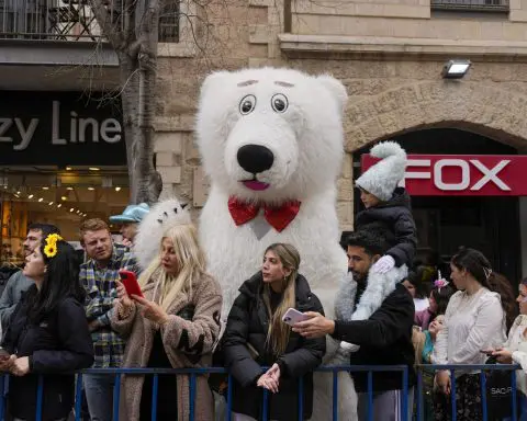 Jerusalem marks festive holiday of Purim in shadow of war