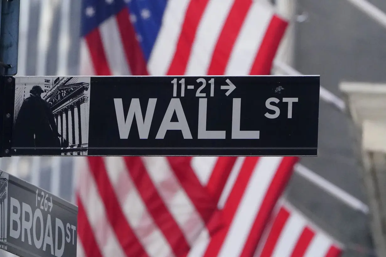 FILE PHOTO: A U.S flag is seen on the New York Stock Exchange in the Manhattan borough of New York City