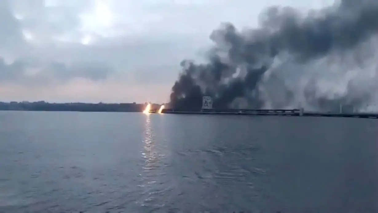 Smoke and fire erupt from an explosion on Ukraine's largest dam, the DniproHES, in Zaporizhzhia