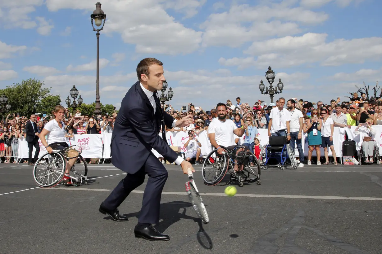 France's president pounds a punching bag on camera, and Europe notices