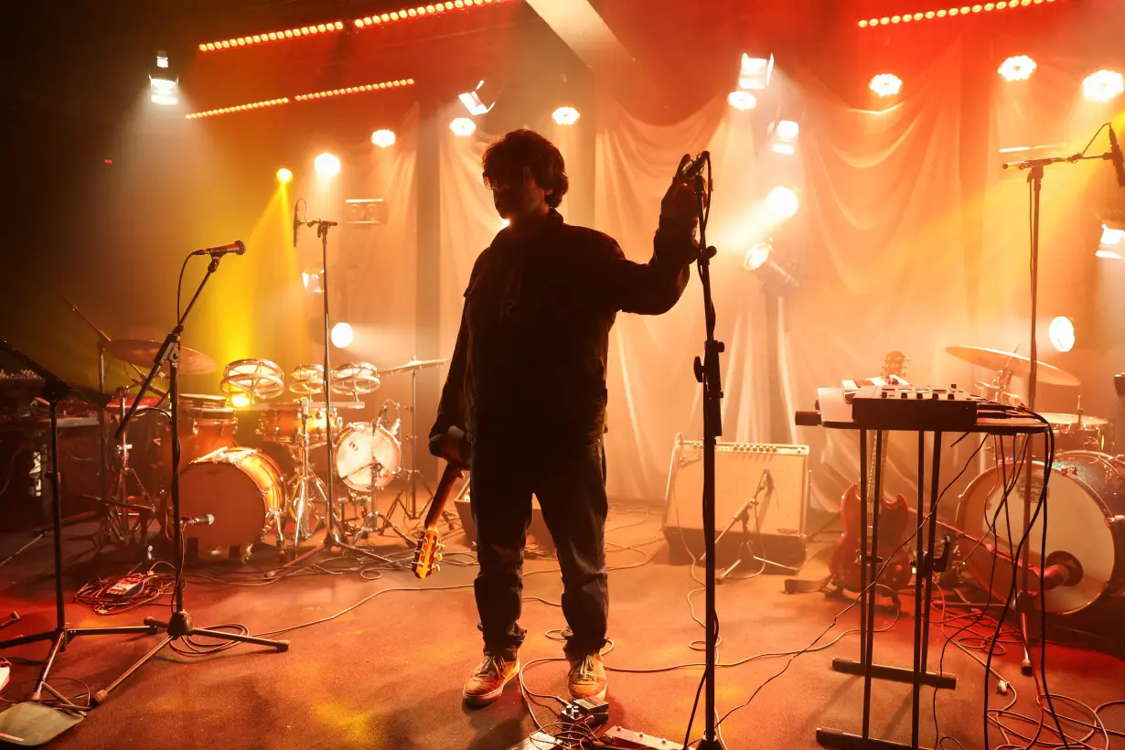 Musician, producer and singer Zeid Hamdan performs on stage during an event