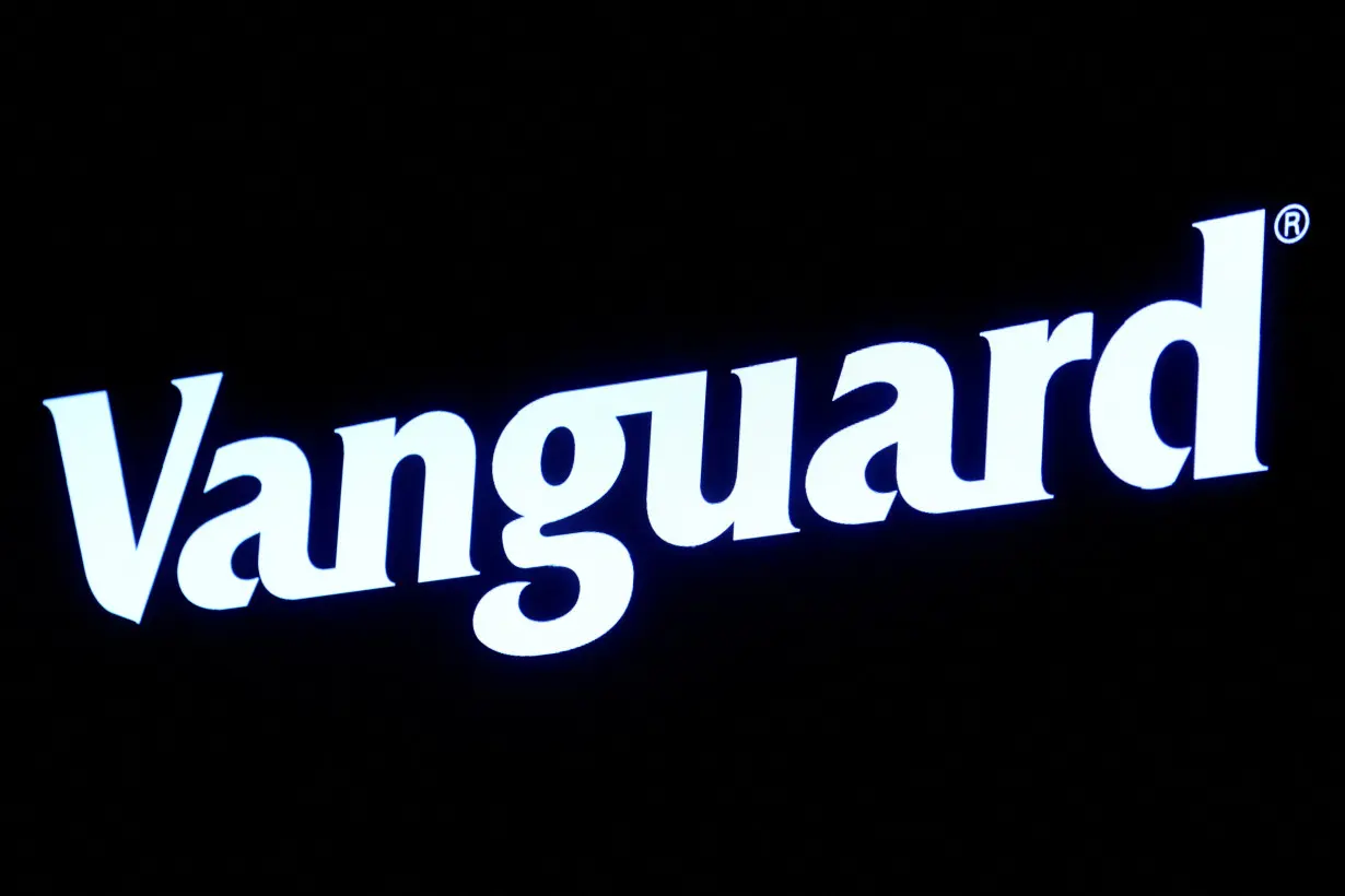 FILE PHOTO: The logo for Vanguard is displayed on a screen on the floor of the NYSE in New York