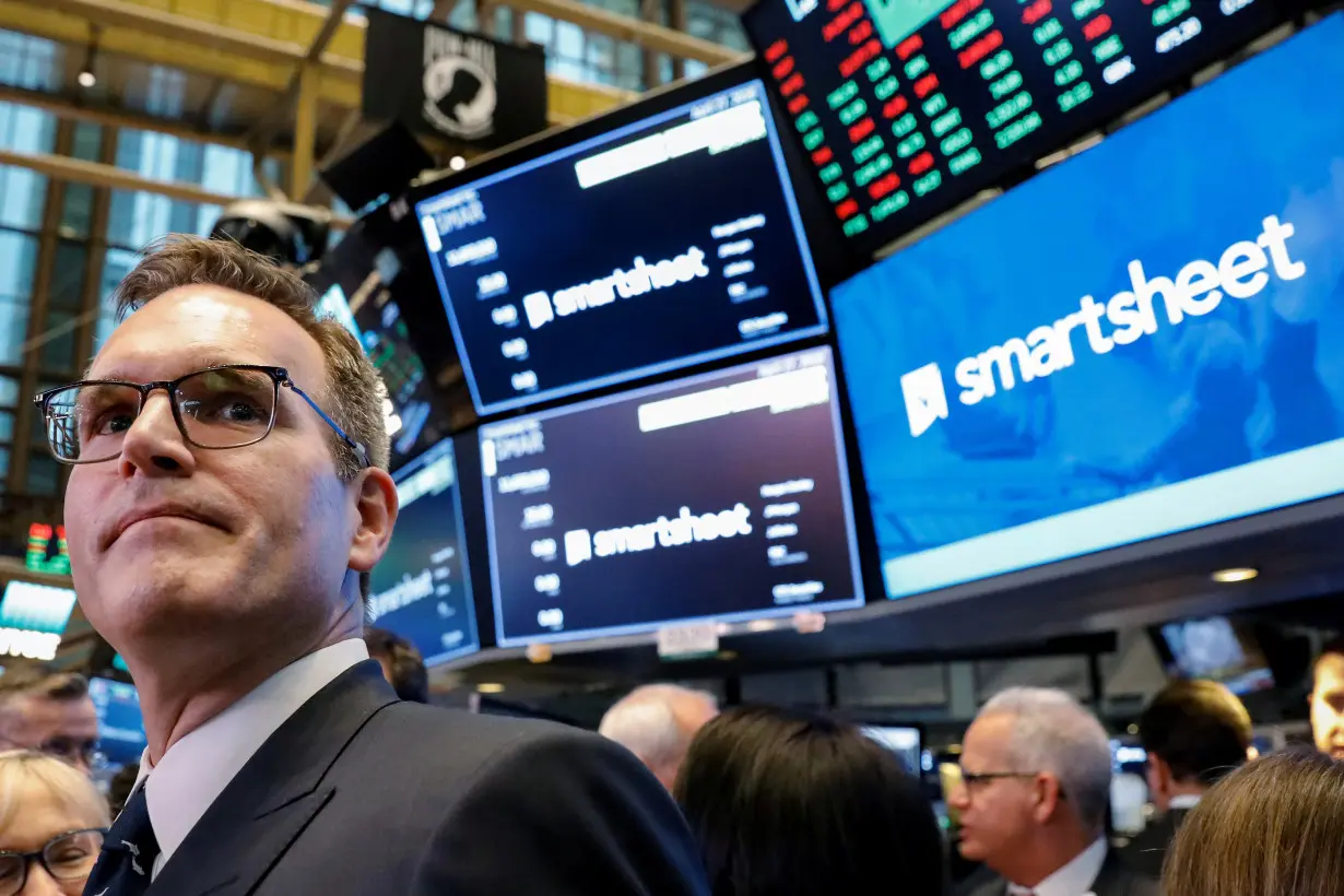 FILE PHOTO: Smartsheet Inc. President and CEO Mark Mader attends his company's IPO on the floor of the NYSE in New York