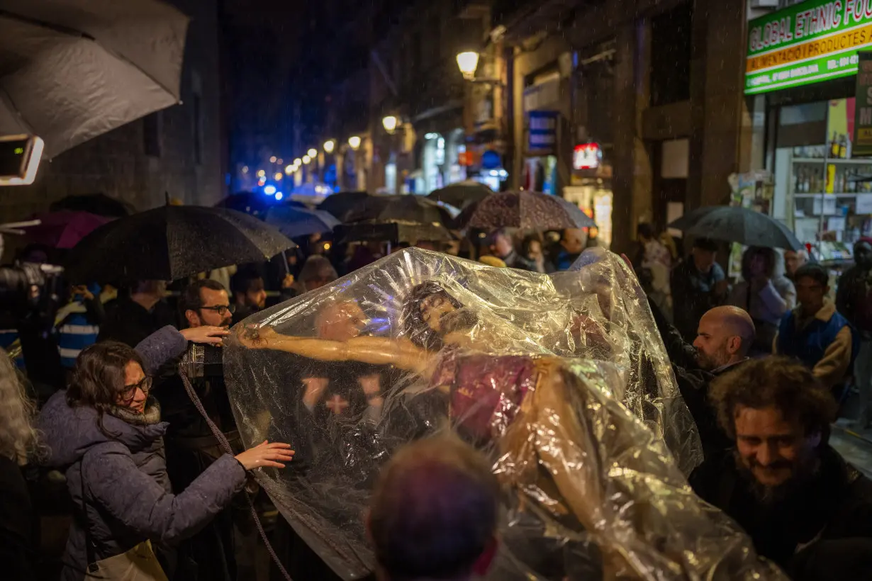 A religious procession in Barcelona celebrates rain during a severe drought in northeast Spain