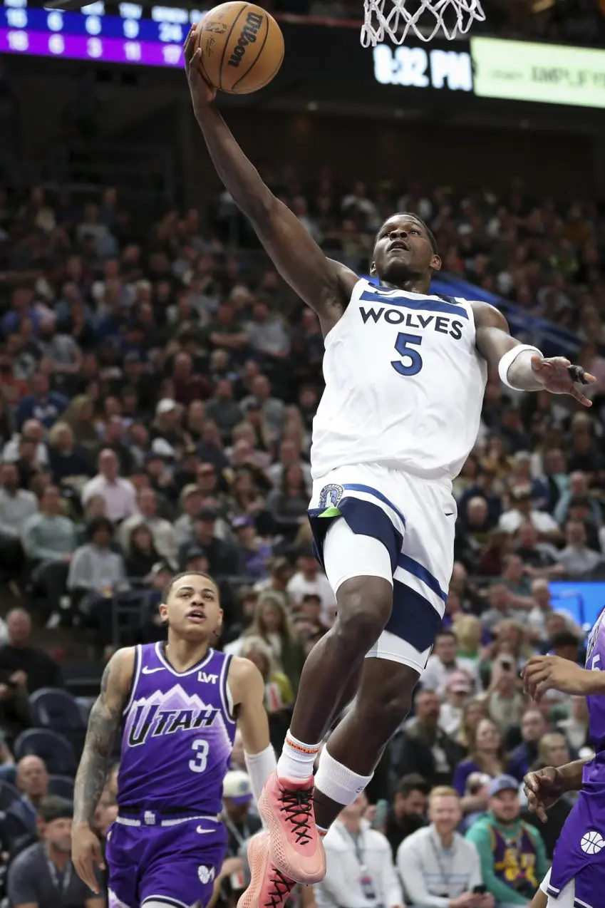 LA Post: Anthony Edwards throws down huge dunk over John Collins in Timberwolves' win against Jazz