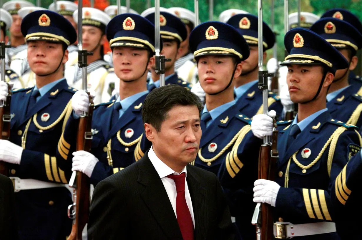 FILE PHOTO: Mongolian Prime Minister Sukhbaatar Batbold inspects an honour guard during an official welcoming ceremony in the Great Hall of the People in Beijing