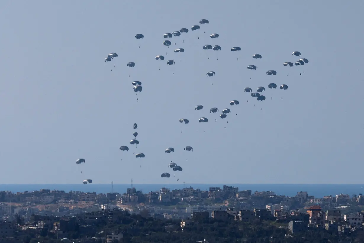 Packages fall towards northern Gaza