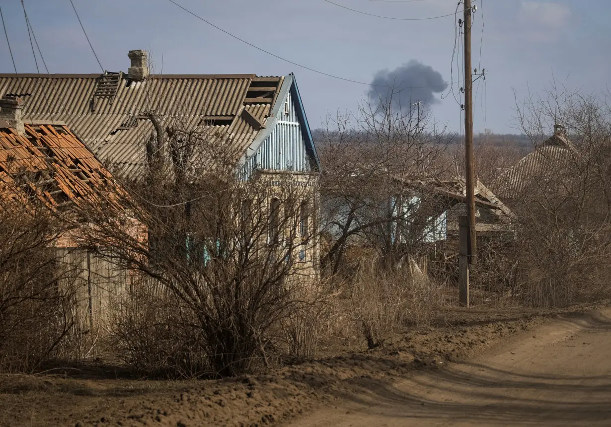 Smoke rises during a shelling near the town of Bakhmut