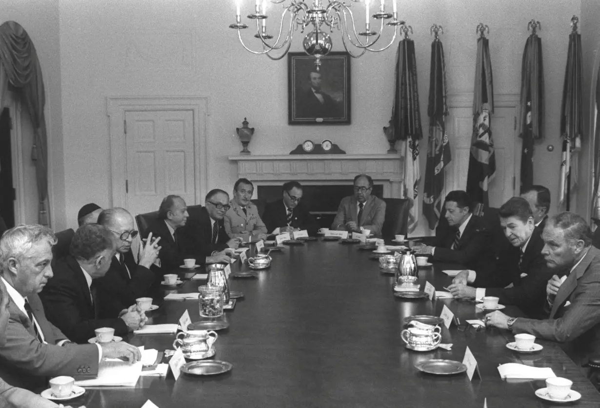 FILE PHOTO: File picture of US president Reagan meeting Israeli delegation including Israeli PM Begin and Defence Minister Sharon in Washington