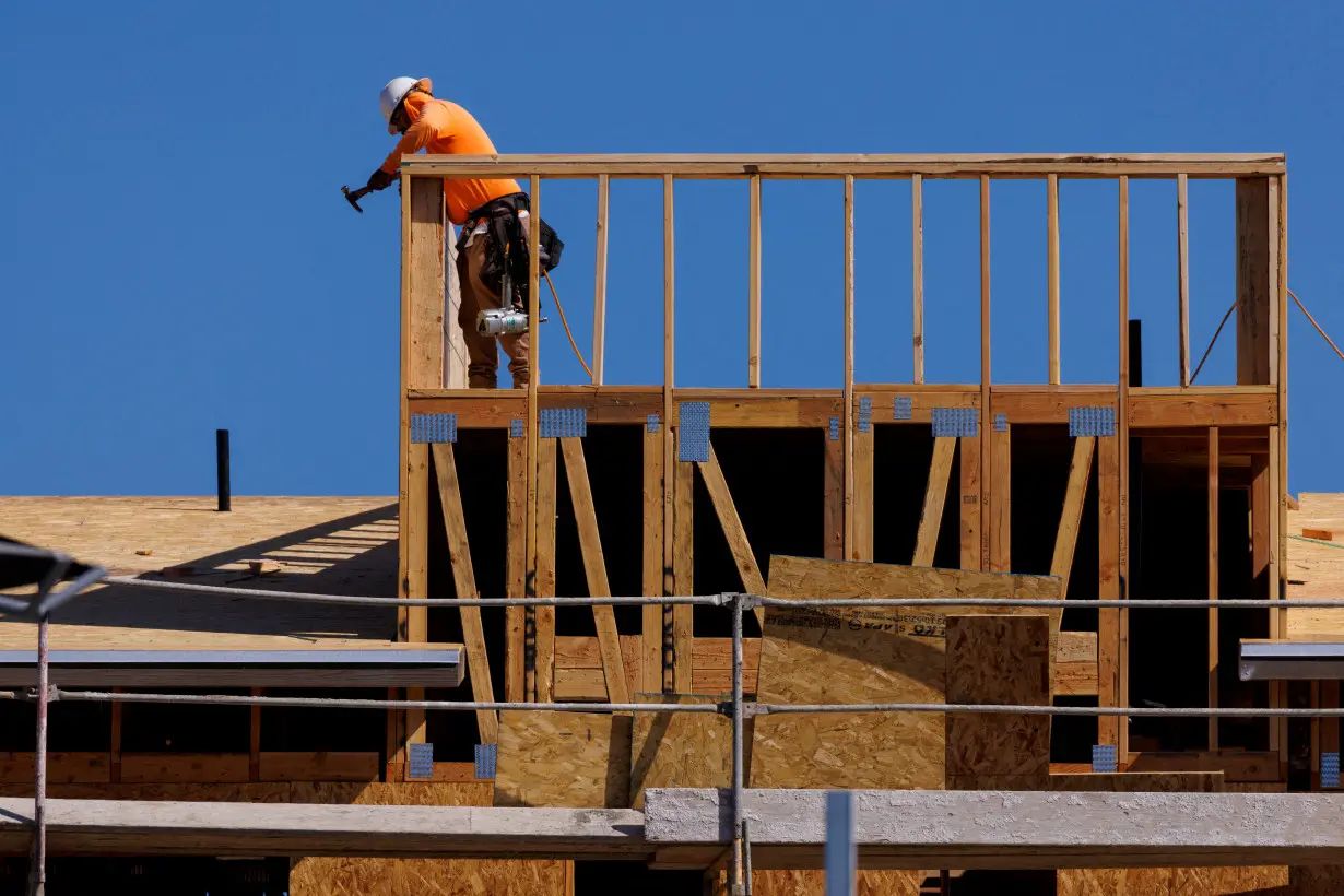 FILE PHOTO: New contemporary attached residential homes are shown under construction in California