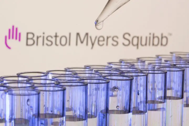 FILE PHOTO: Test tubes are seen in front of a displayed Bristol Myers Squibb logo in this illustration