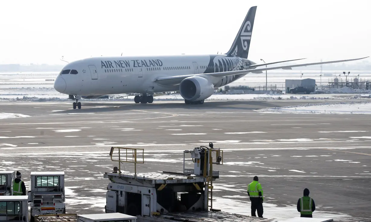 An Air New Zealand Boeing 787-9 Dreamliner plane taxis at O'Hare International Airport in Chicago