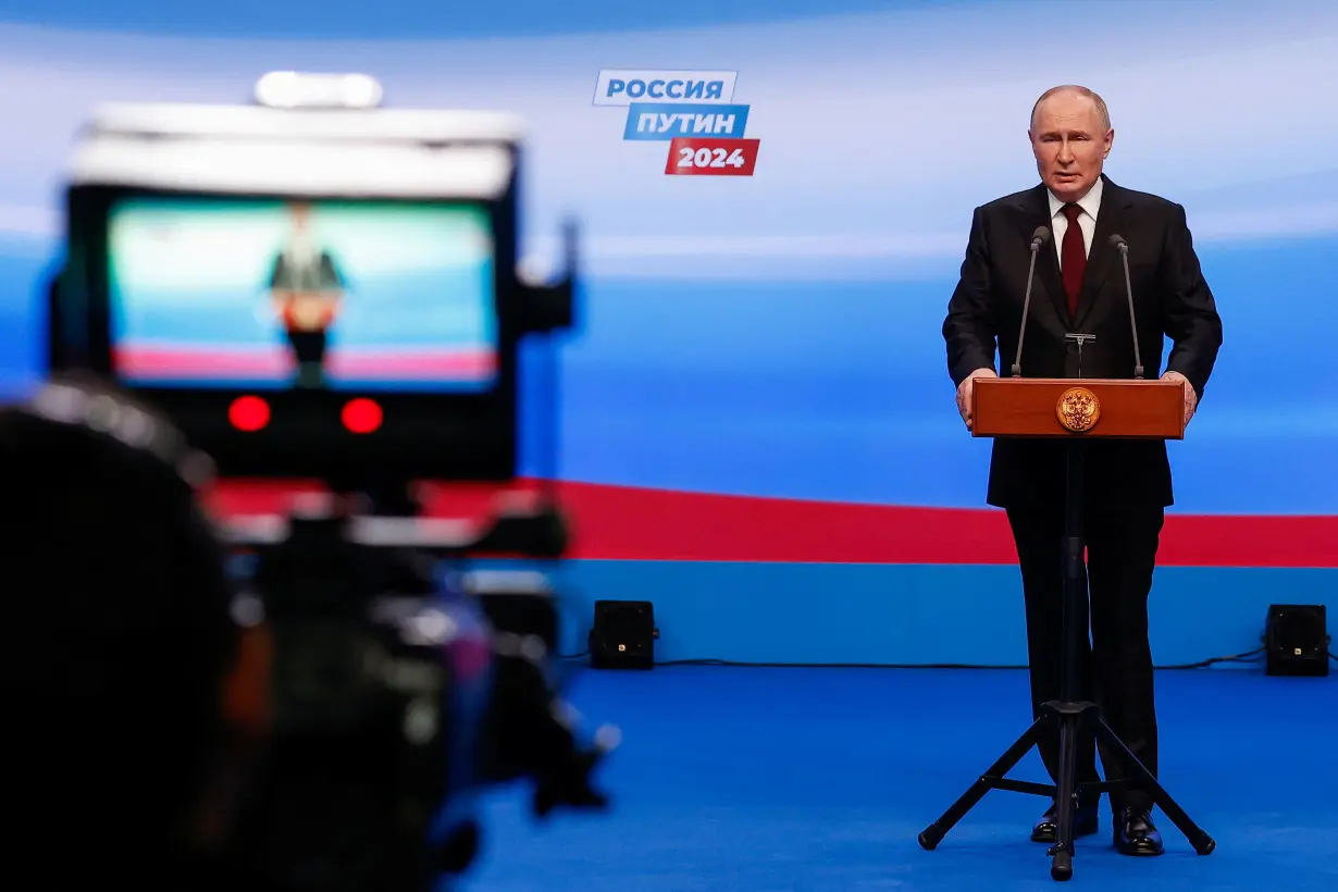 Russian incumbent President Putin speaks after polling stations closed, in Moscow