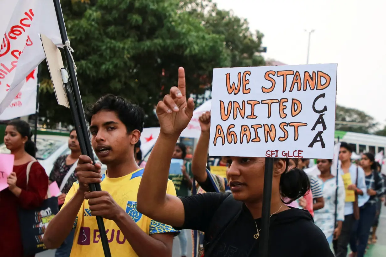 Supporters of the Students' Federation of India (SFI) protest against a new citizenship law, in Kochi