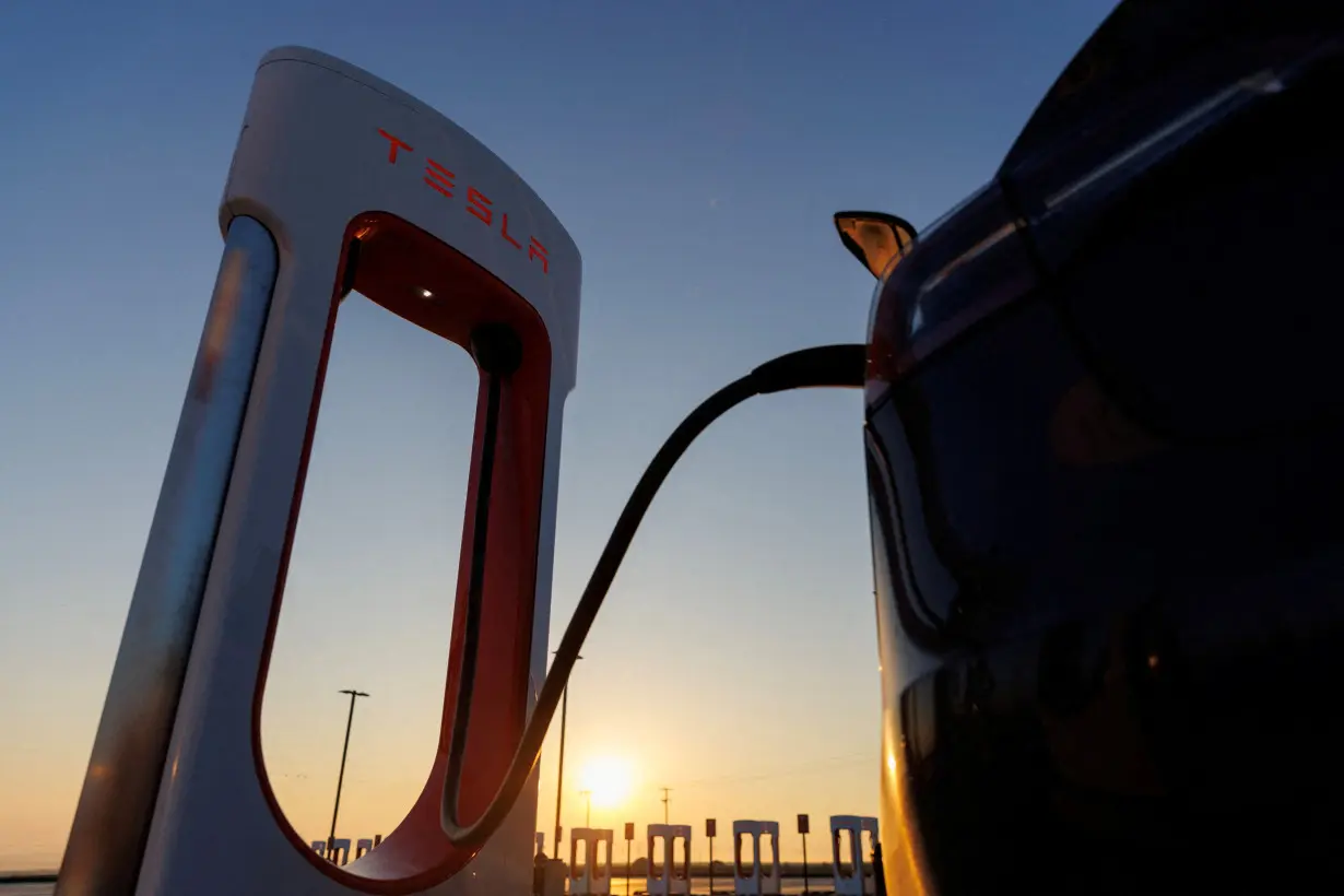 FILE PHOTO: A Tesla supercharging station in California