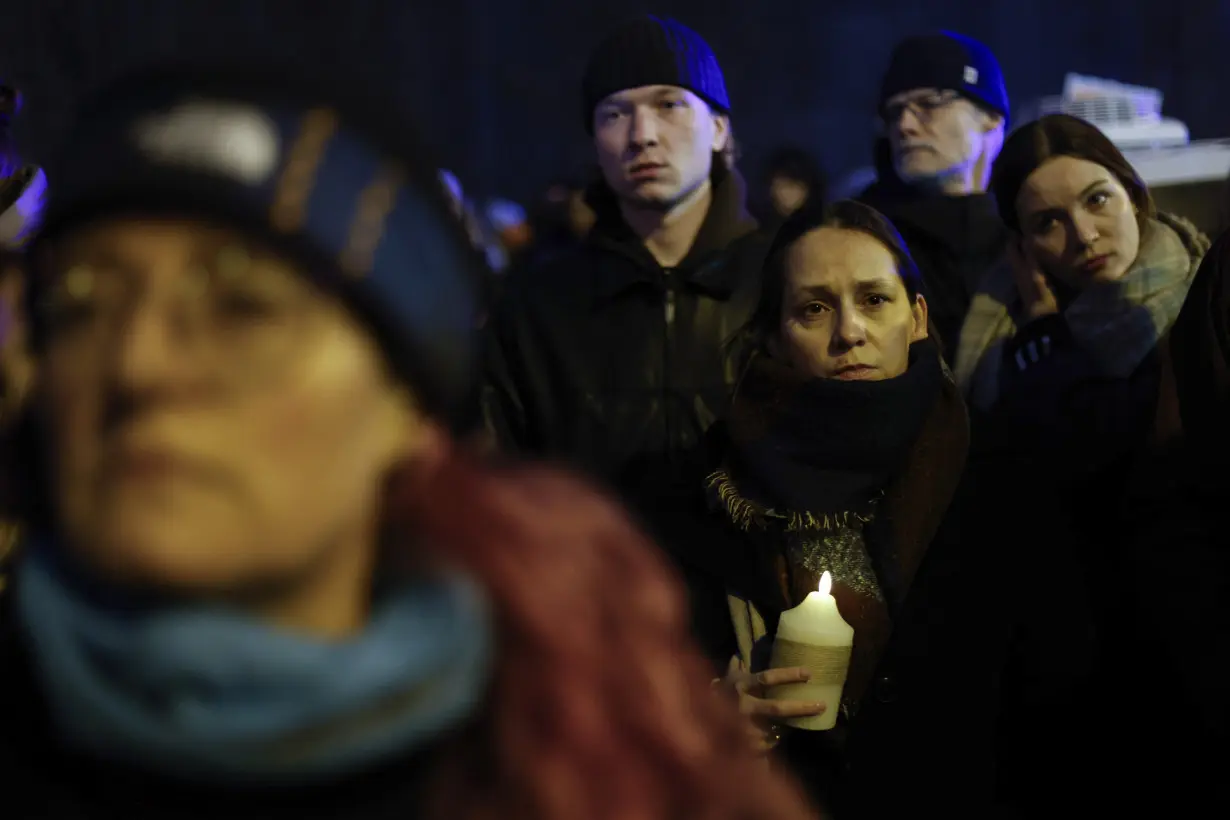 Mourners honor Liza who fled Belarus to Warsaw for a new life but was raped and died in a hospital