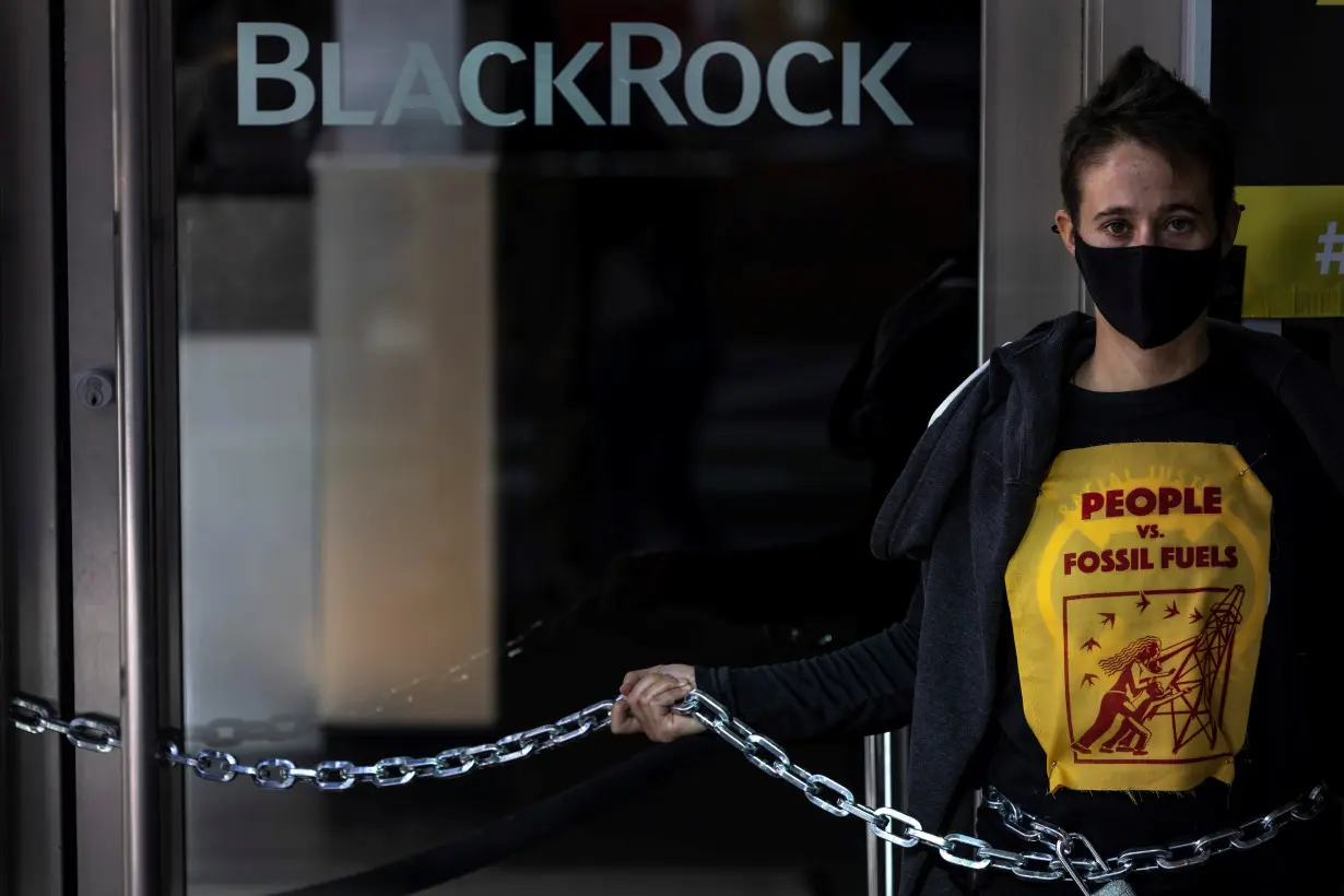 FILE PHOTO: Climate change activists protest outside of BlackRock headquarters ahead of COP26, in San Francisco