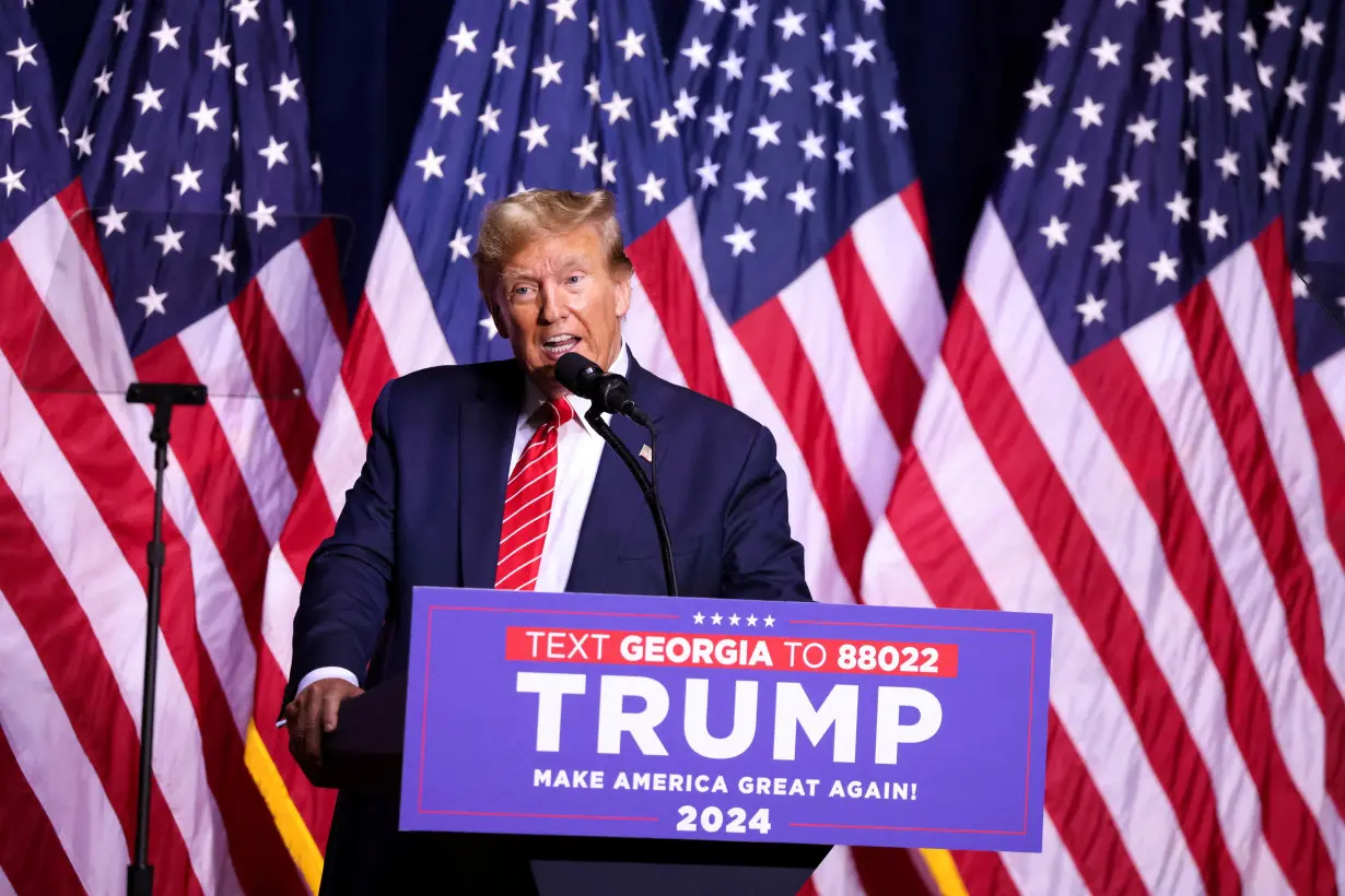 FILE PHOTO: Former U.S. President Trump hosts a campaign rally, in Rome, Georgia