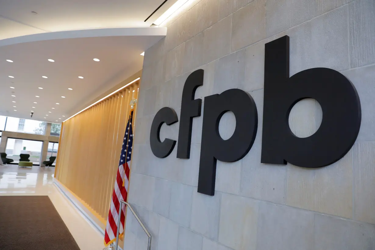 FILE PHOTO: Signage is seen at the Consumer Financial Protection Bureau (CFPB) headquarters in Washington, D.C.