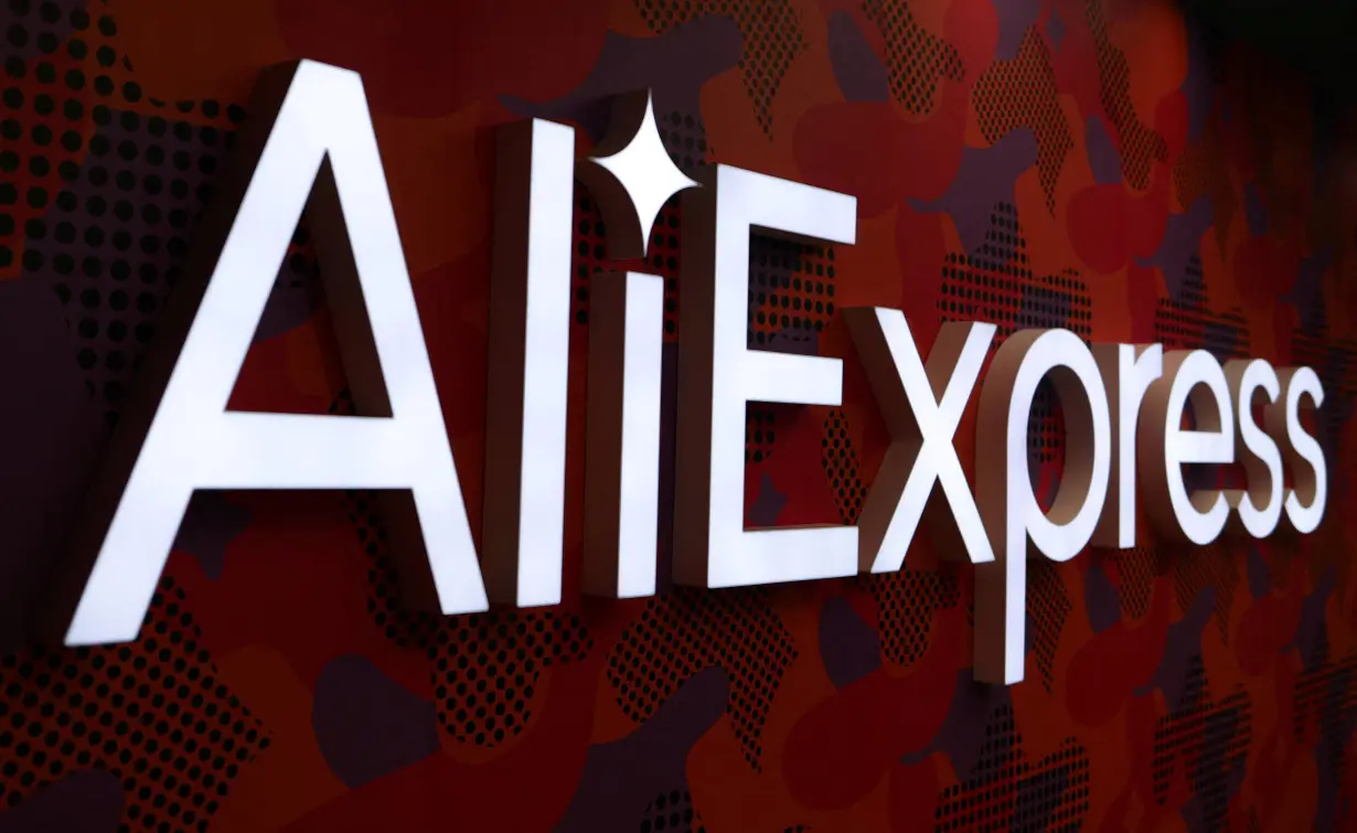 FILE PHOTO: The logo of AliExpress is seen inside the company's office in Moscow