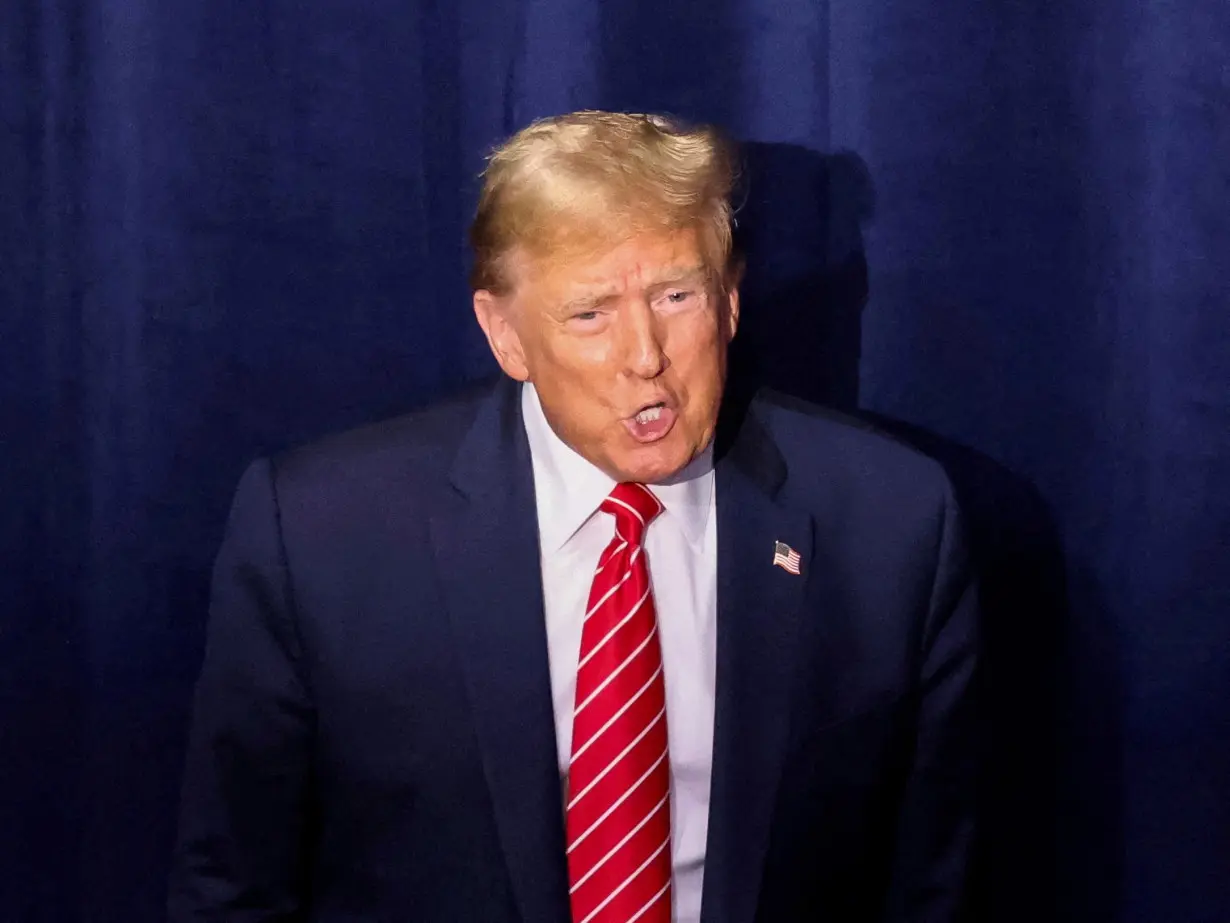 FILE PHOTO: Former U.S. President Trump hosts a campaign rally, in Rome, Georgia