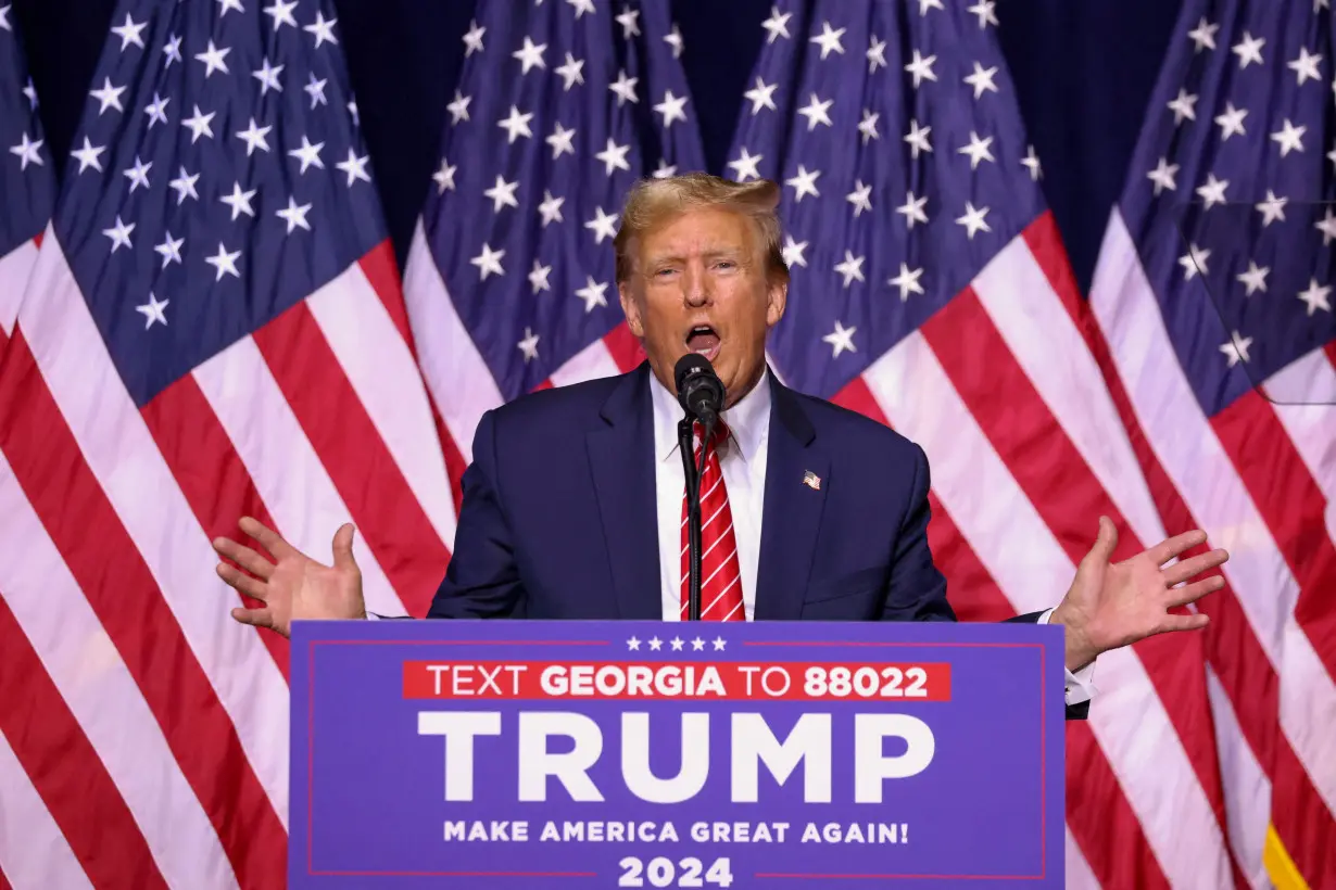 FILE PHOTO: Former U.S. President Trump hosts a campaign rally, in Rome, Georgia