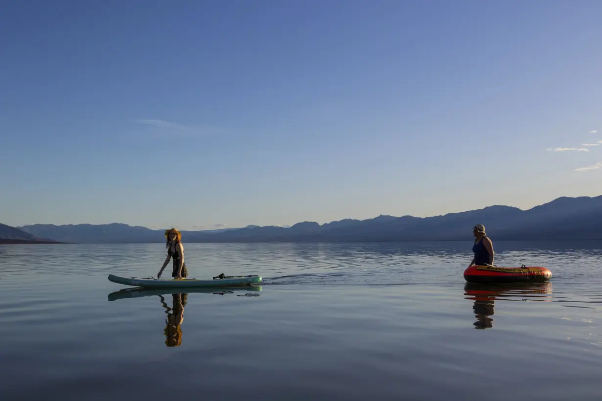 Kayakers paddle in Death Valley after rains replenish lake in one of Earth's driest spots