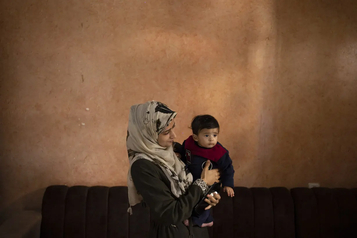 CORRECTION Israel Palestinians Gaza War Babies