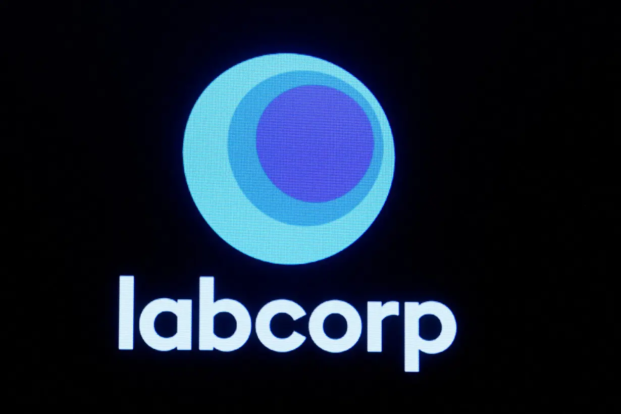 FILE PHOTO: The logo for Labcorp is displayed on a screen on the floor of the NYSE in New York