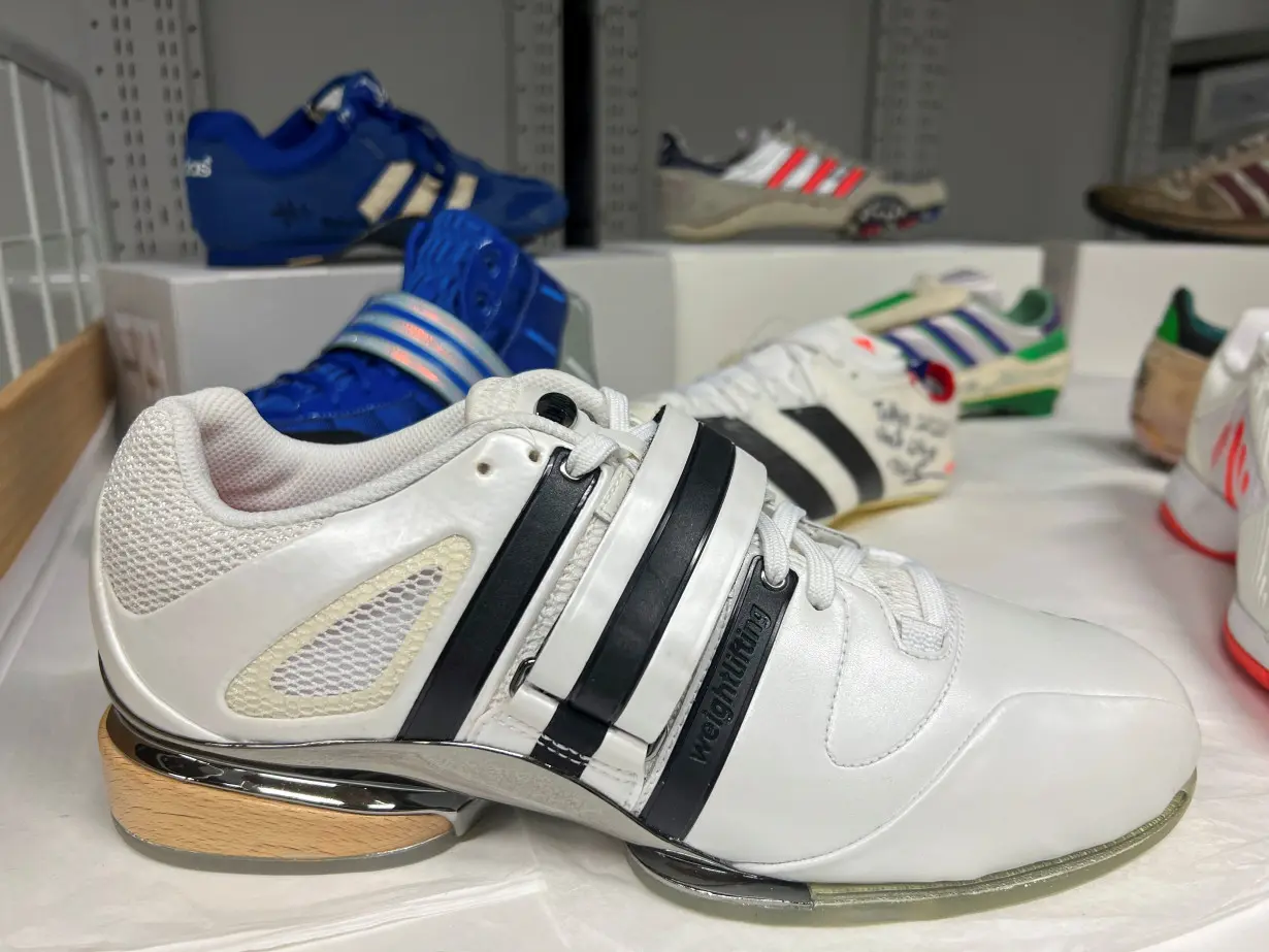 An Adidas weightlifting shoe made for the 2008 Beijing Olympics is pictured, among other Olympic shoes, at the Adidas archive in the company’s headquarters in Herzogenaurach