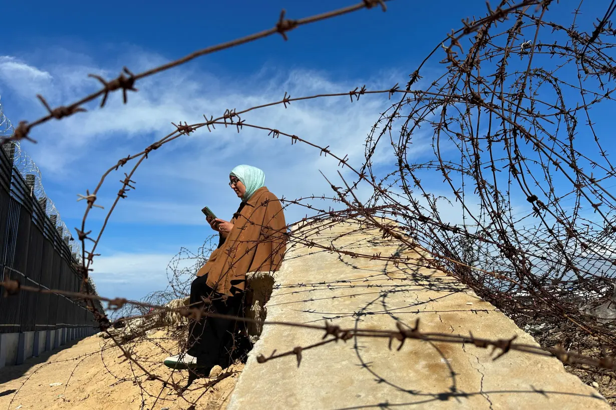 Displaced Palestinians try to get internet signal to communicate with their relatives