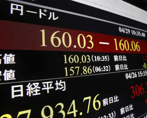Japan's currency falls to its weakest since 1990 against the dollar as the yen keeps yelping