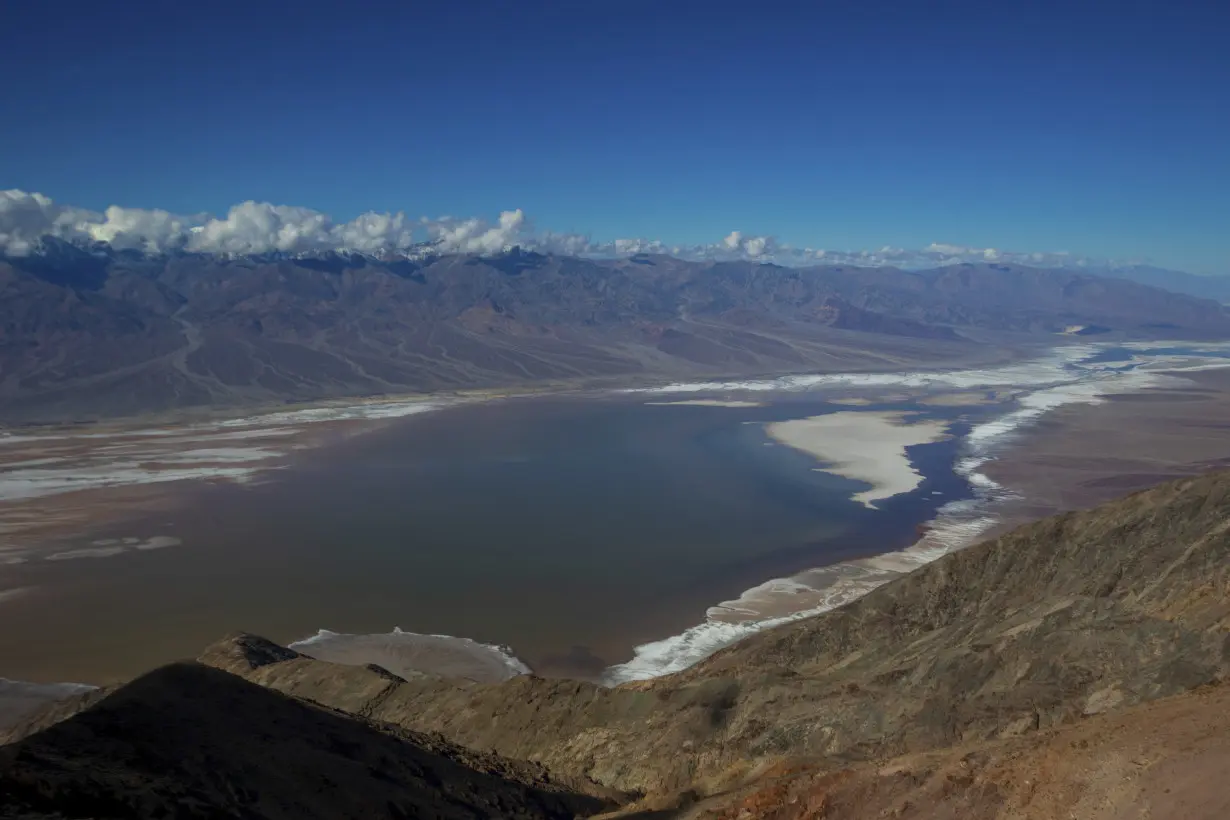 Kayakers paddle in Death Valley after rains replenish lake in one of Earth's driest spots