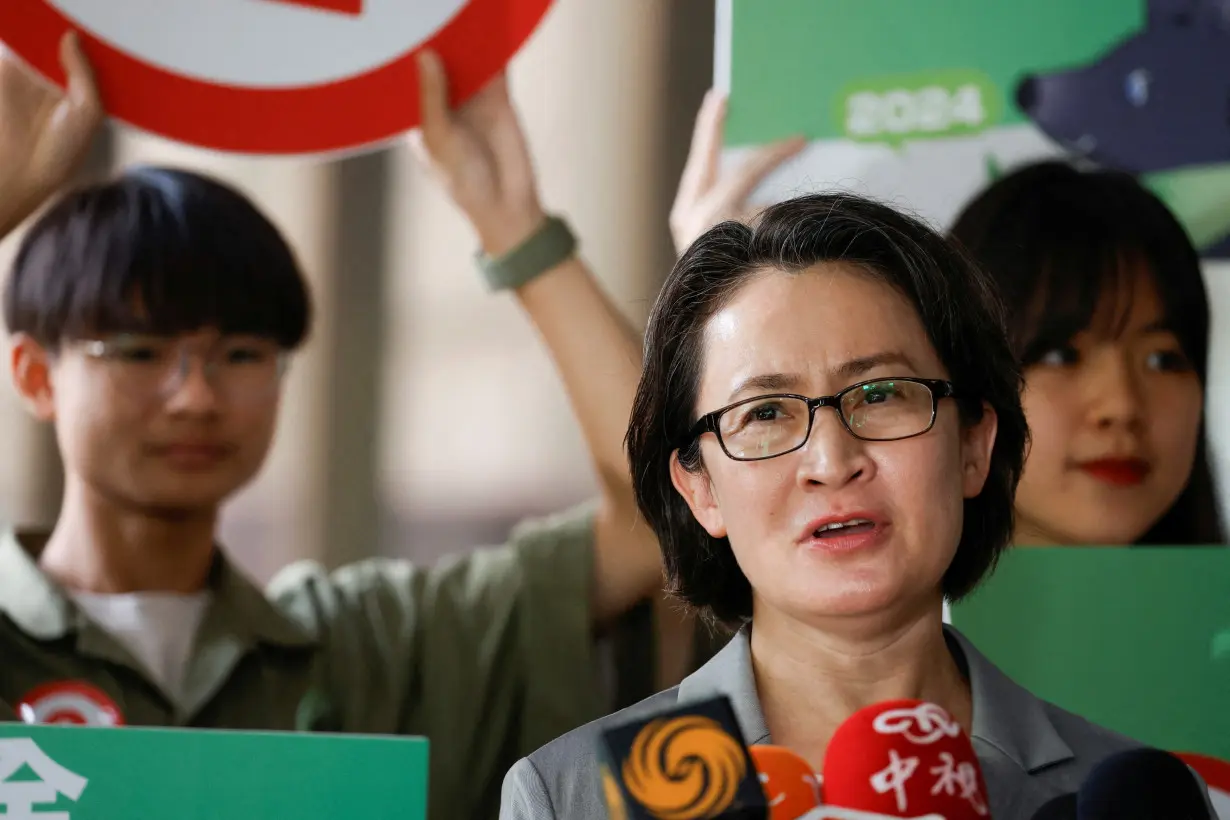 FILE PHOTO: Hsiao Bi-khim, vice president candidate for the ruling Democratic Progressive Party (DPP), talks to the media outside the Central Election Commission in Taipei